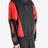 Black coat worn by a person, showing the coat's fit