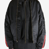 Black jacket worn by a person, showing the jacket's fit