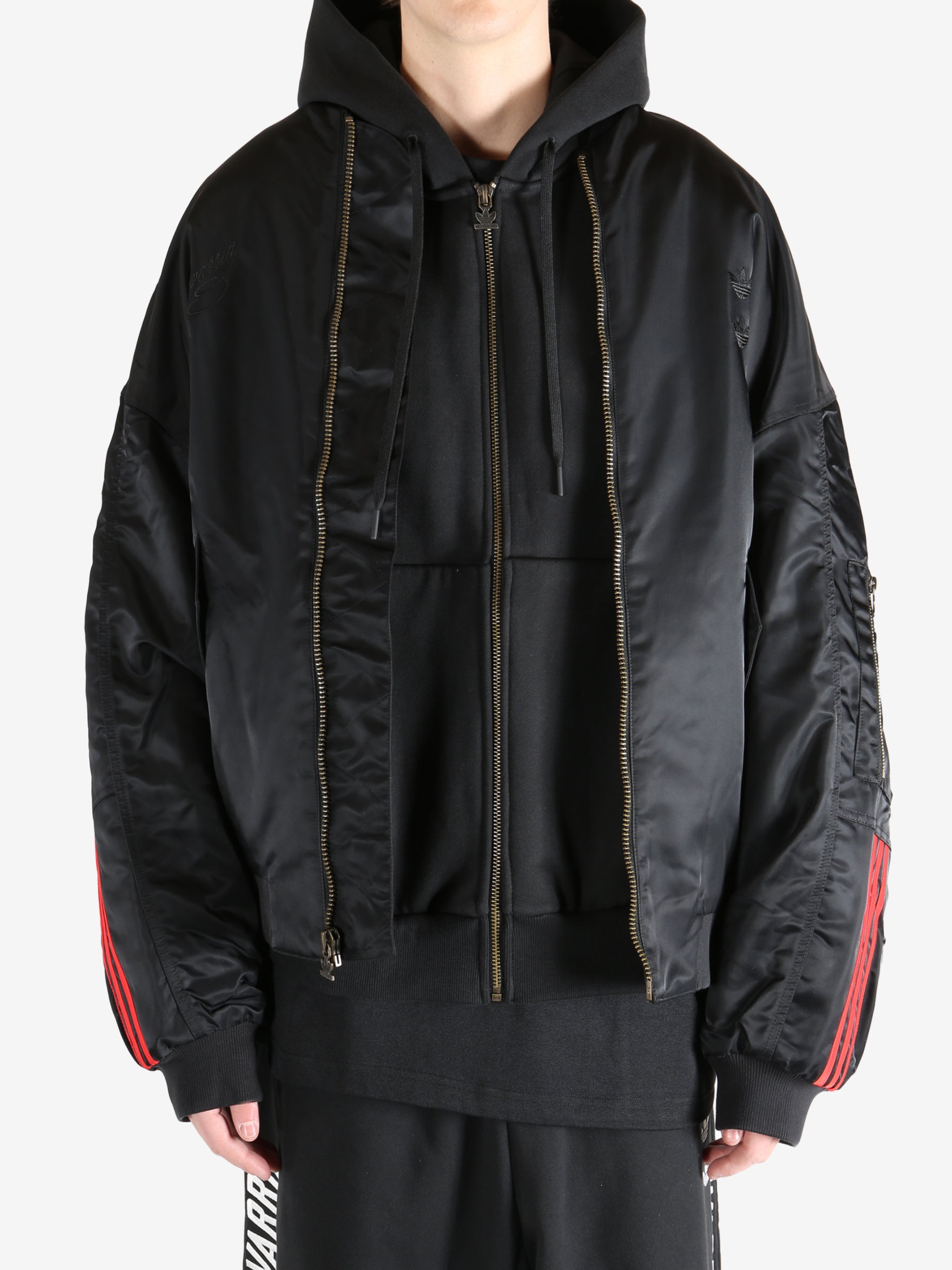 Black jacket worn by a person, showing the jacket's fit