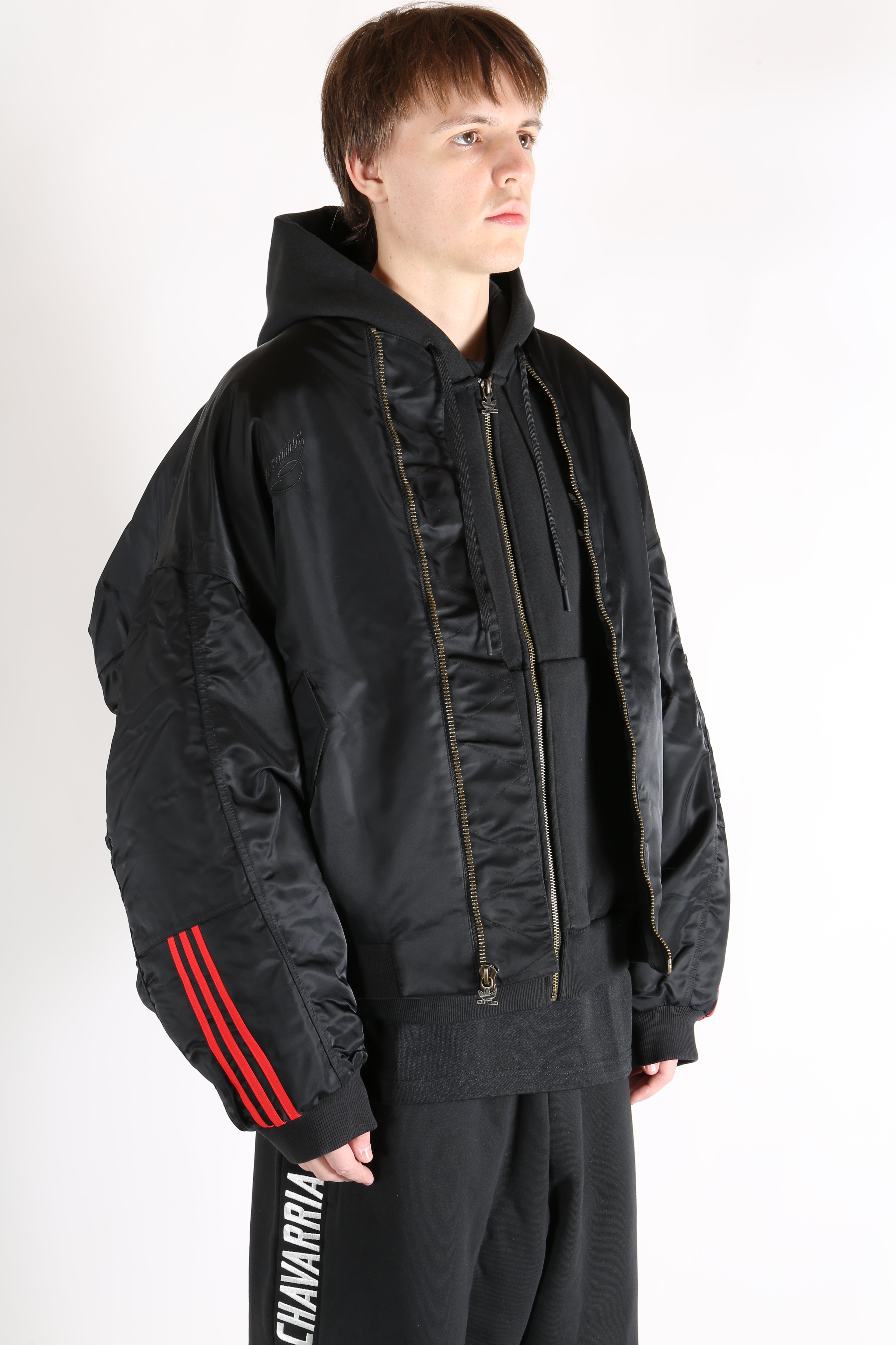 Black jacket worn by a person, showing the jacket's fit