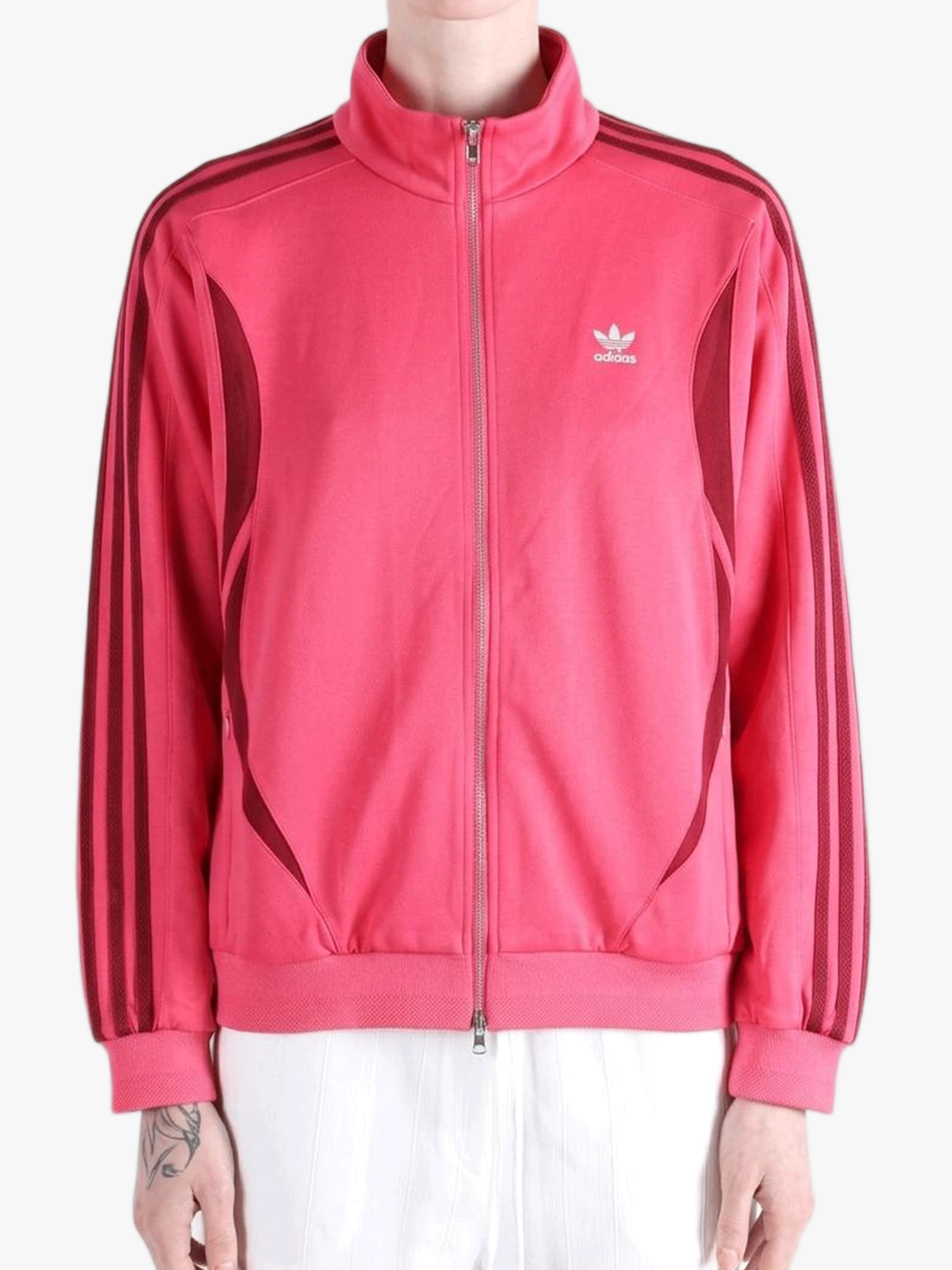 Red top worn by a person, showing the top fit