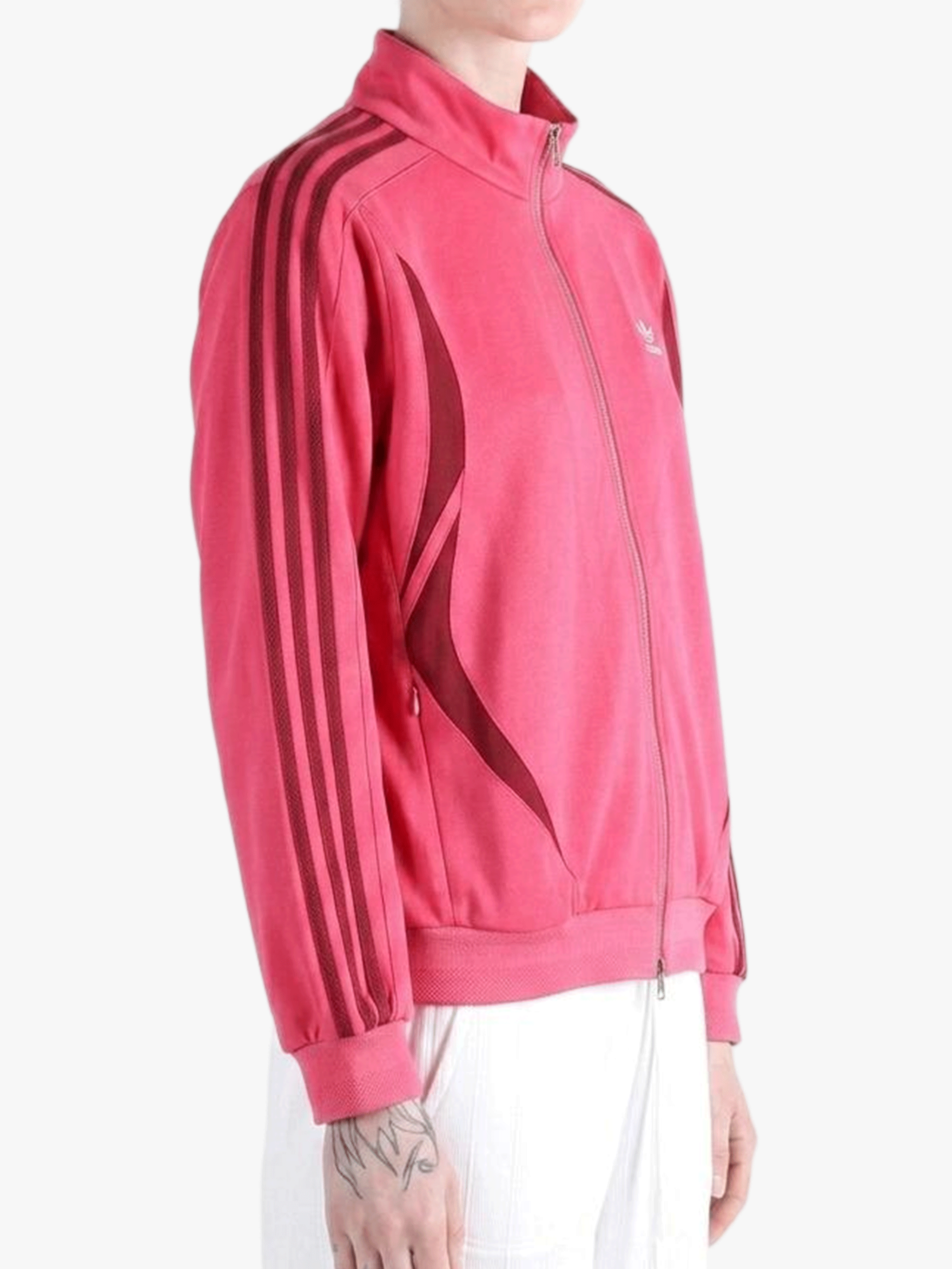 Red top worn by a person, showing the top fit