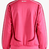 Red top worn by a person, showing the top fit