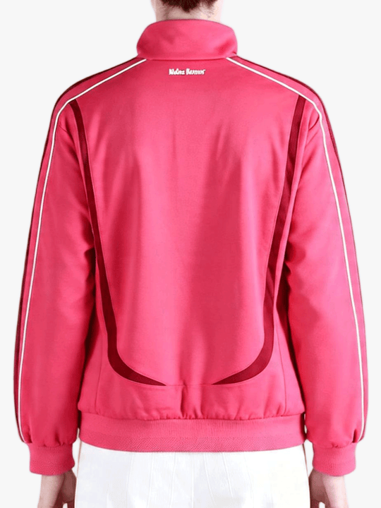 Red top worn by a person, showing the top fit