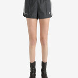 Black shorts worn by a person, showing the shorts's fit
