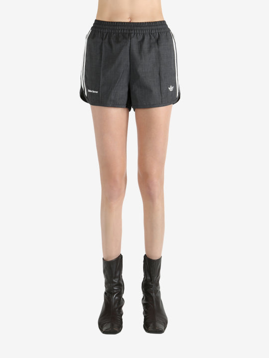 Black shorts worn by a person, showing the shorts's fit
