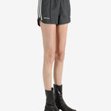 Black shorts worn by a person, showing the shorts's fit