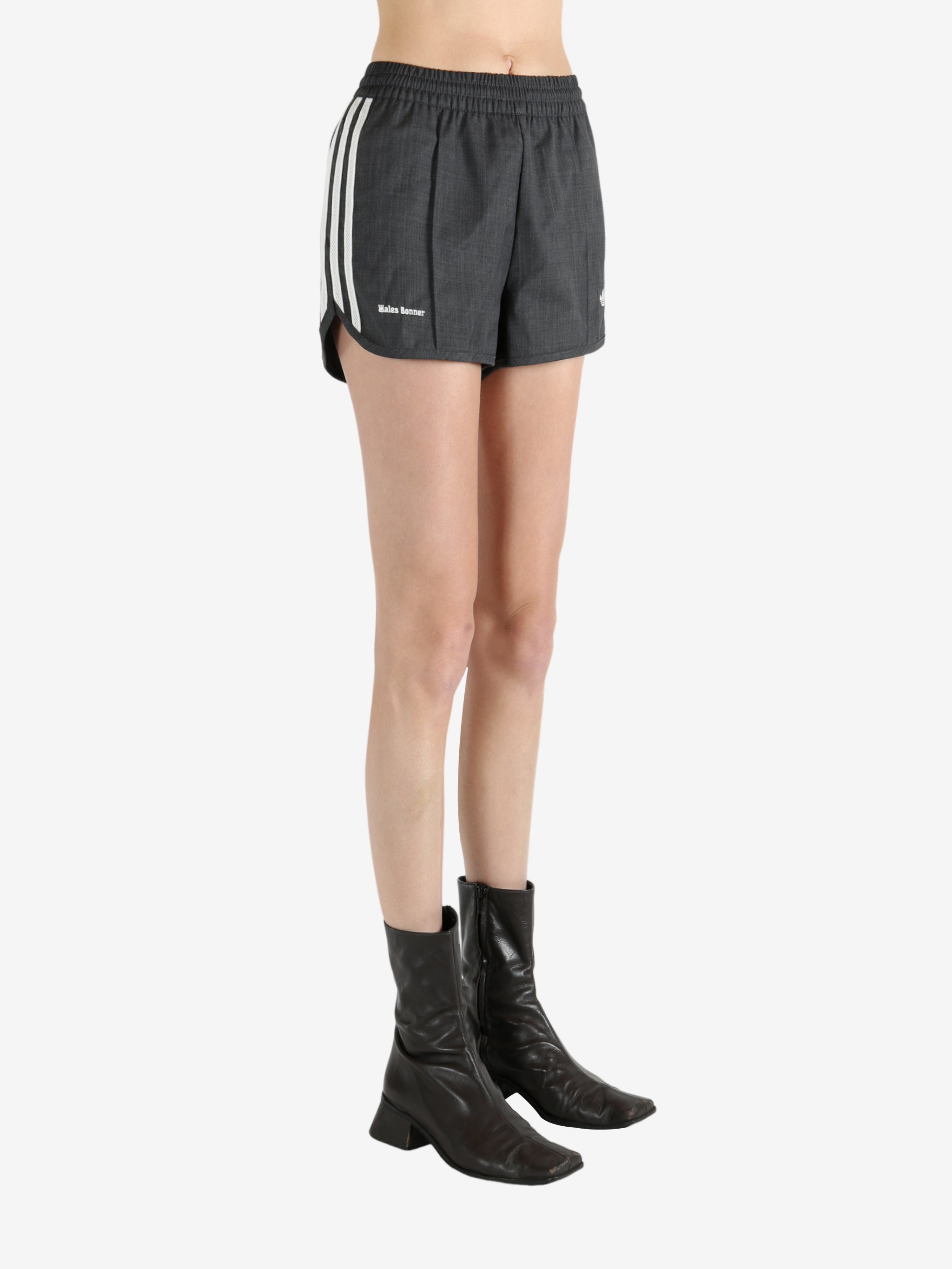 Black shorts worn by a person, showing the shorts's fit