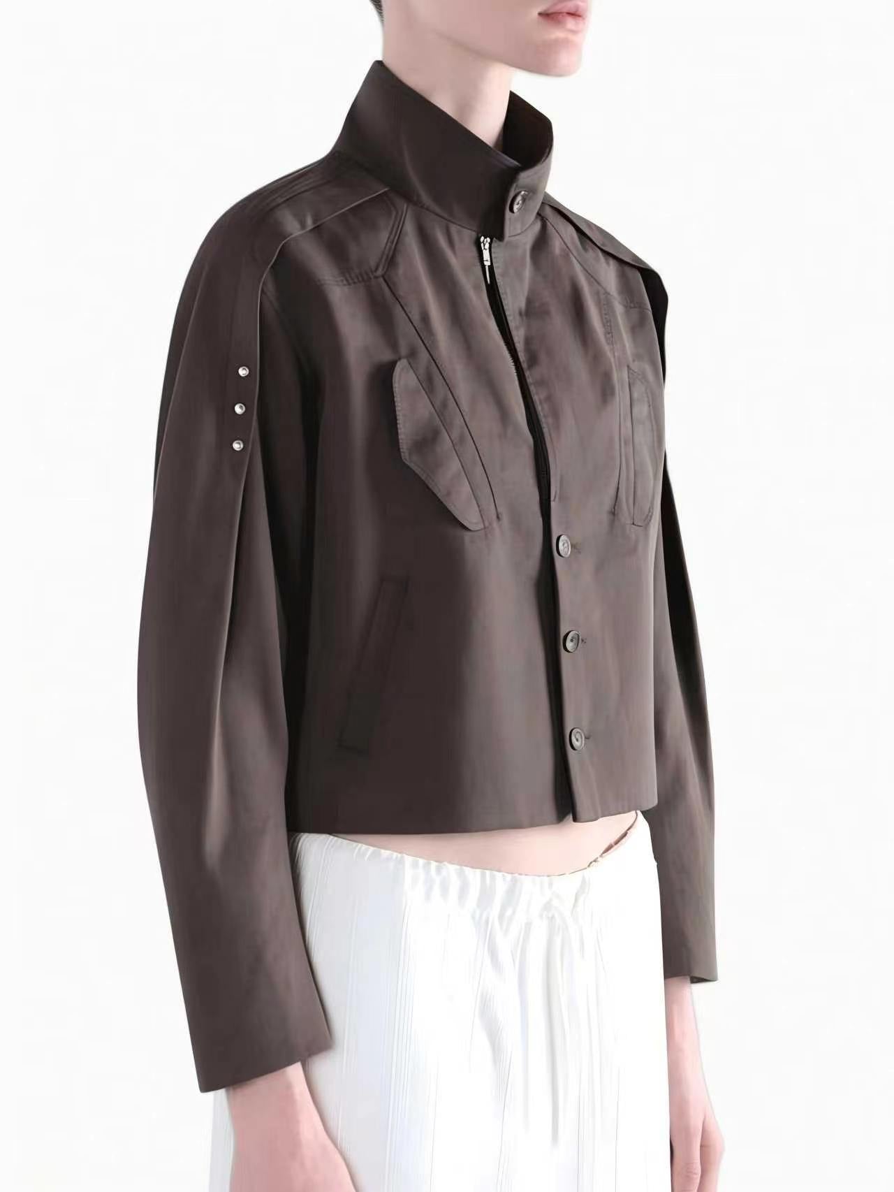 Brown jacket worn by a person, side view