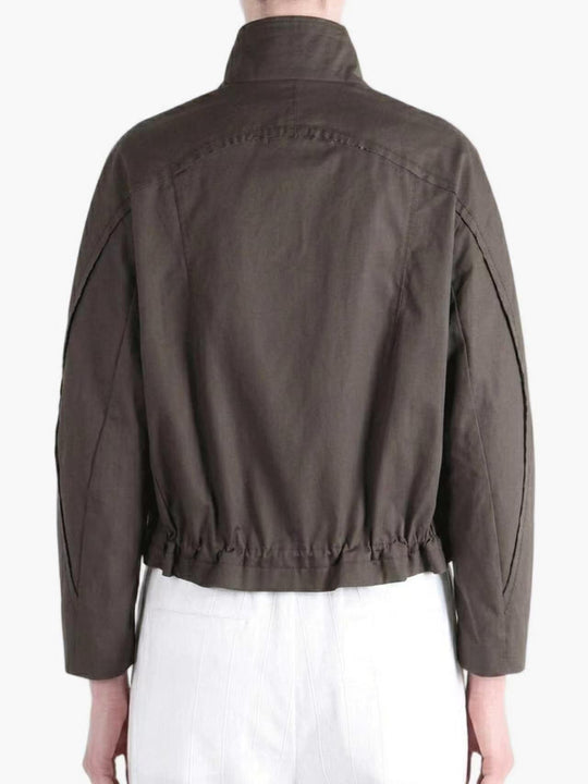 Brown jacket worn by a person, back view