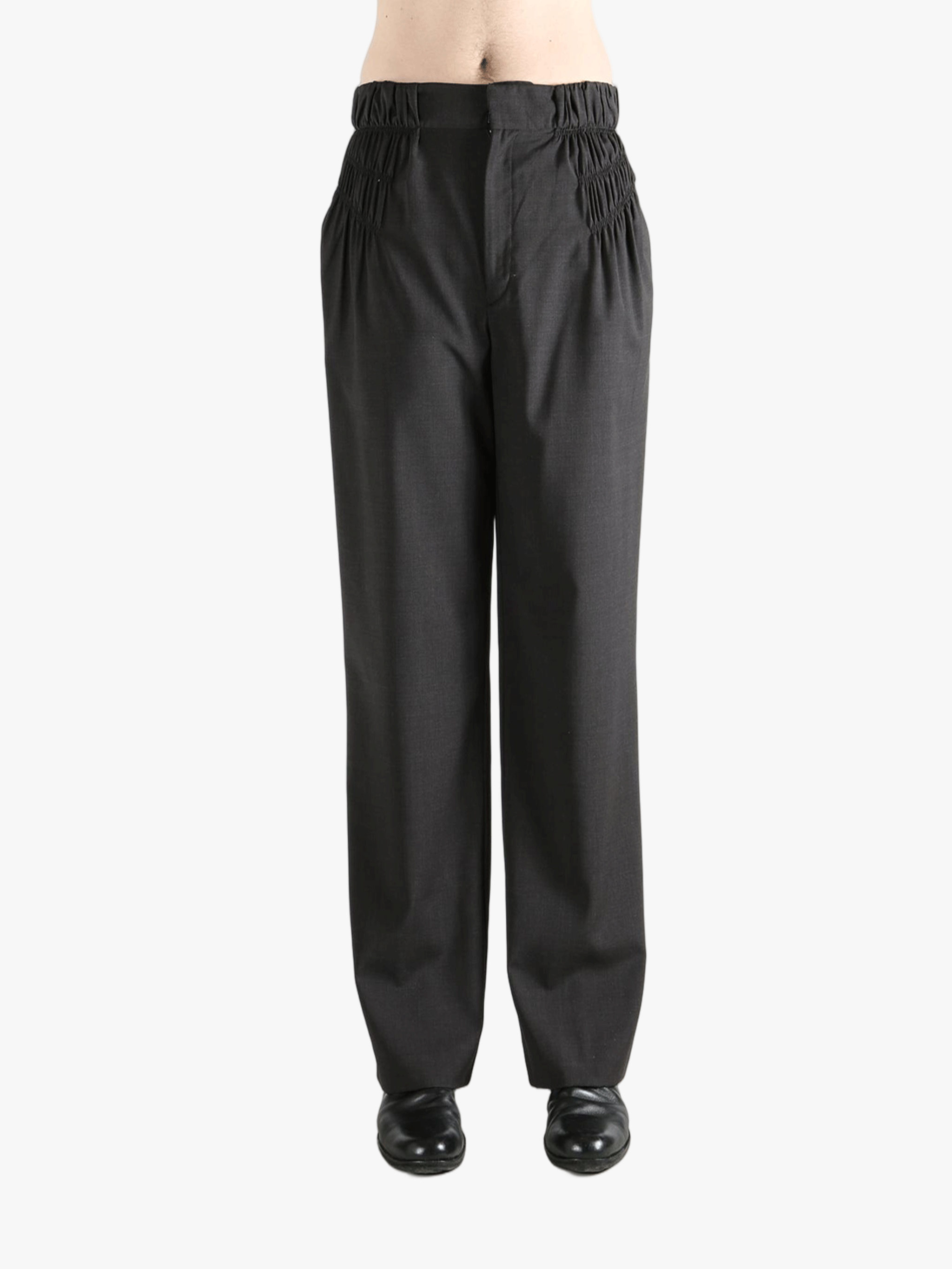 Grey pant worn by a person, showing the pant fit