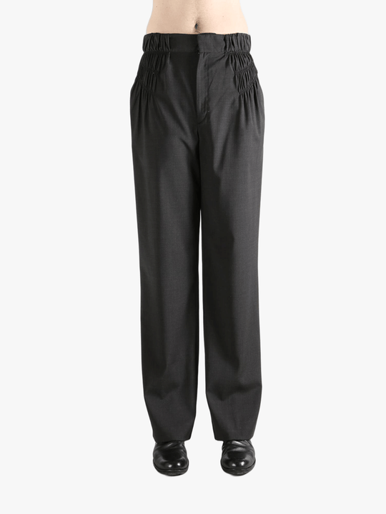 Grey pant worn by a person, showing the pant fit