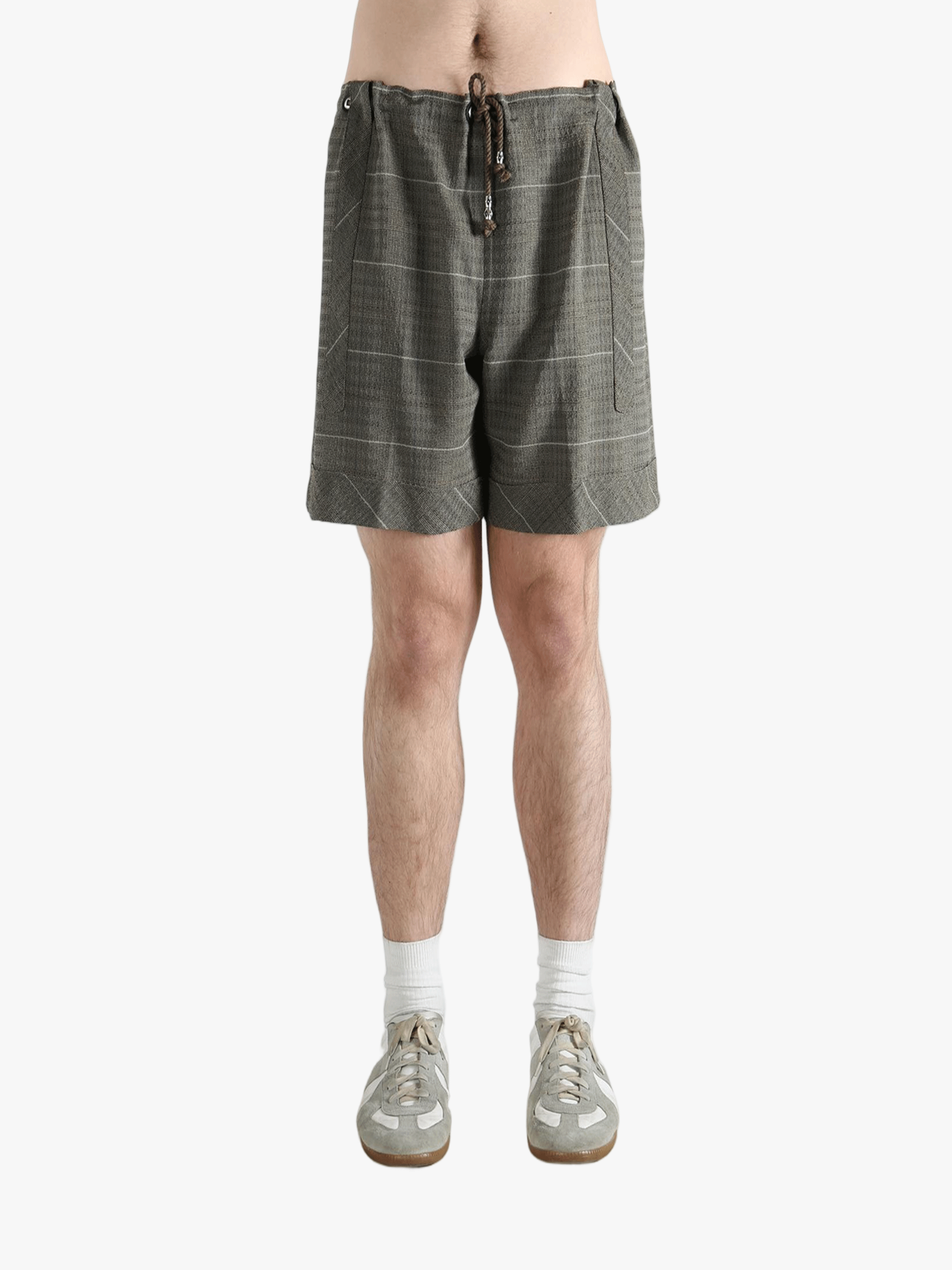 Grey short worn by a person, showing the short fit