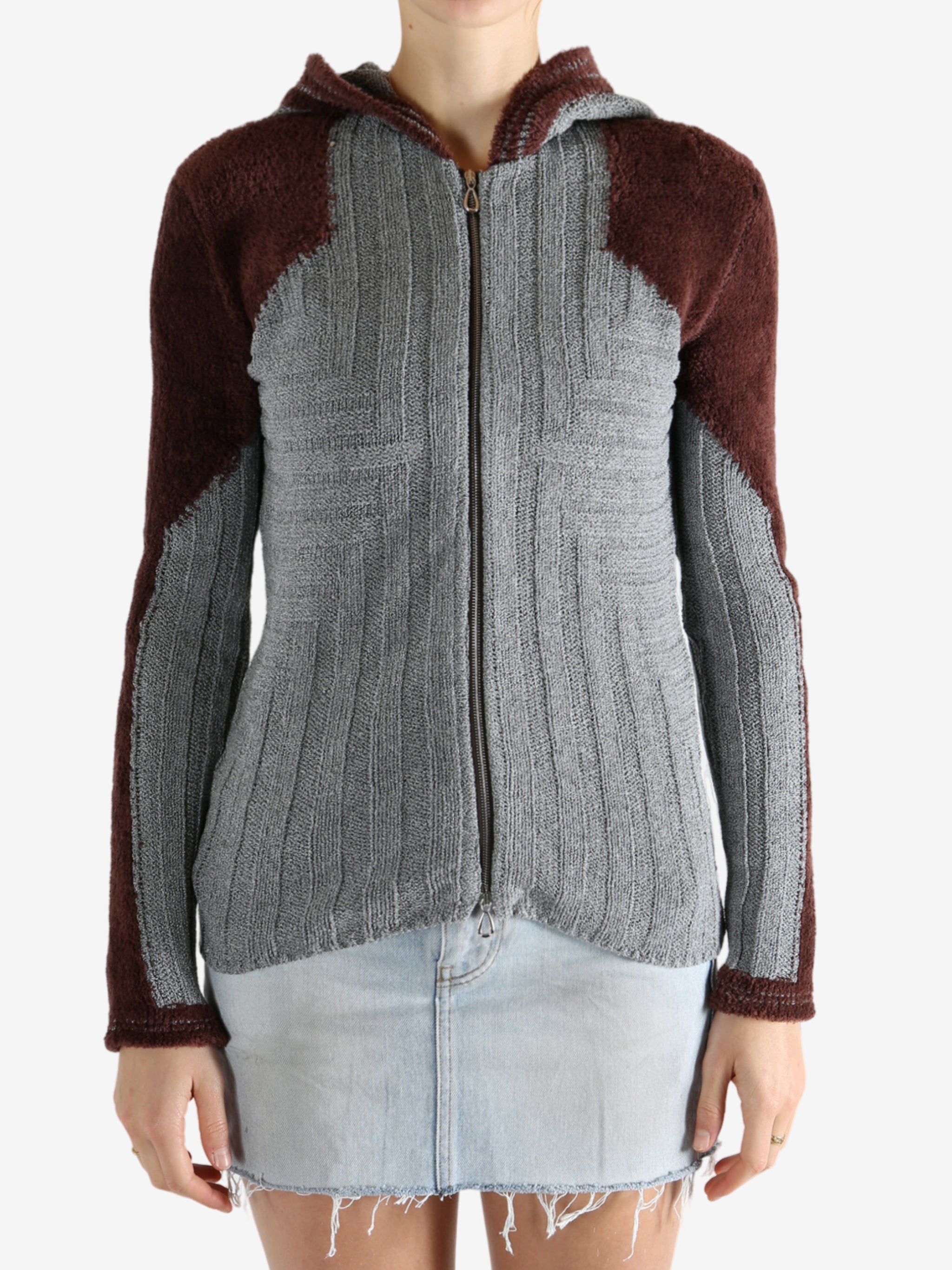 Grey shirt worn by a person, showing the shirt's fit