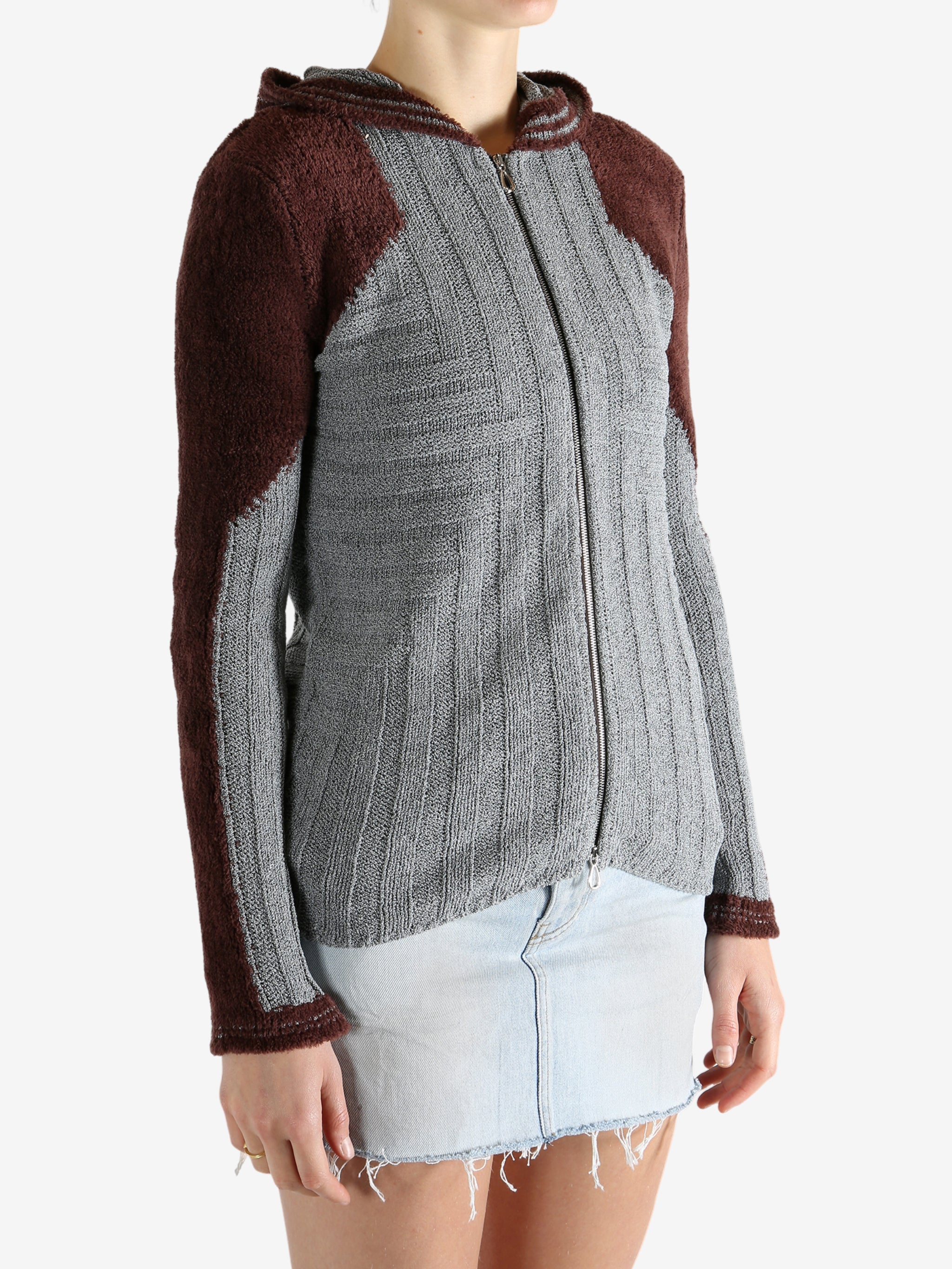 Grey shirt worn by a person, showing the shirt's fit