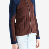 Burgundy knitwear worn by a person, showing the knitwear's fit