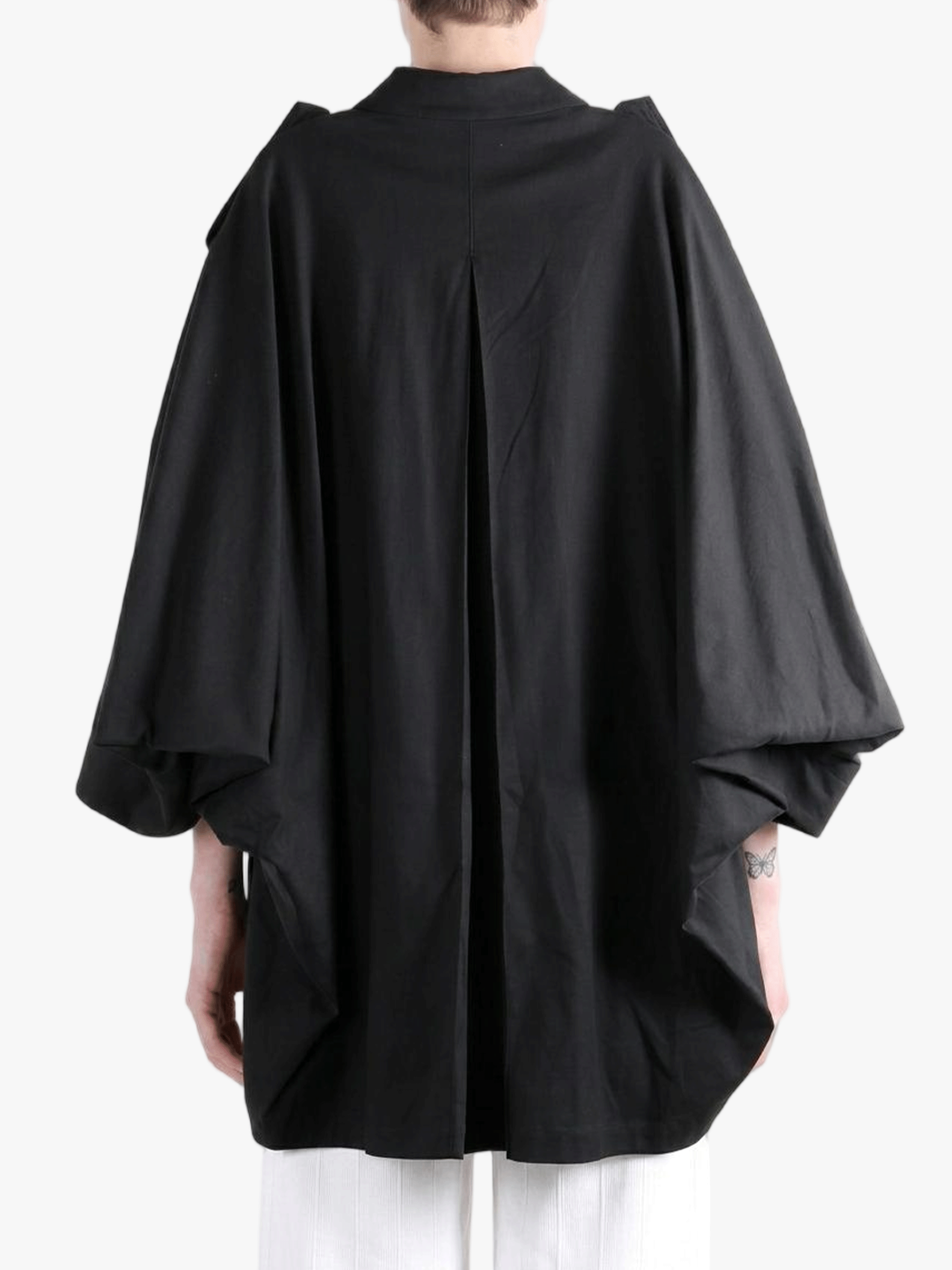 Black jacket worn by a person, back view