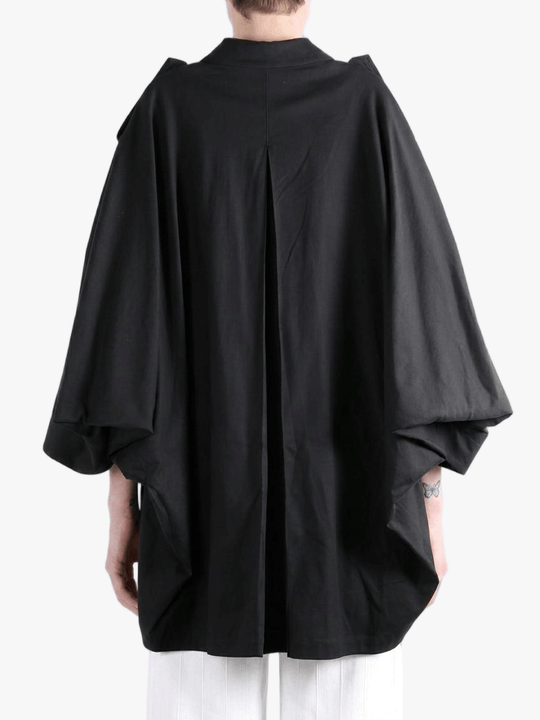 Black jacket worn by a person, back view