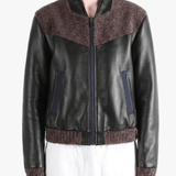 Black jacket worn by a person, showing the jacket fit