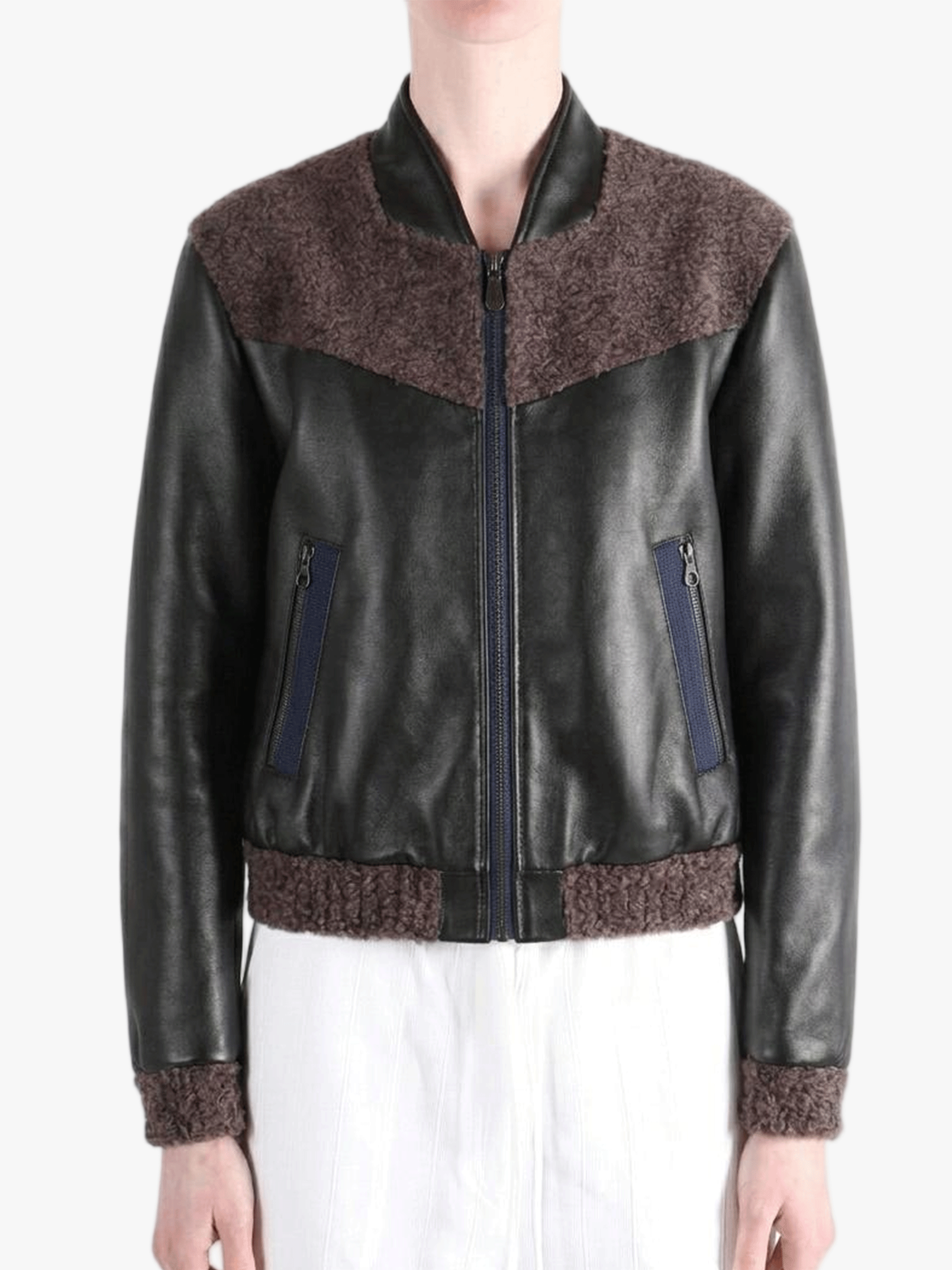 Black jacket worn by a person, showing the jacket fit