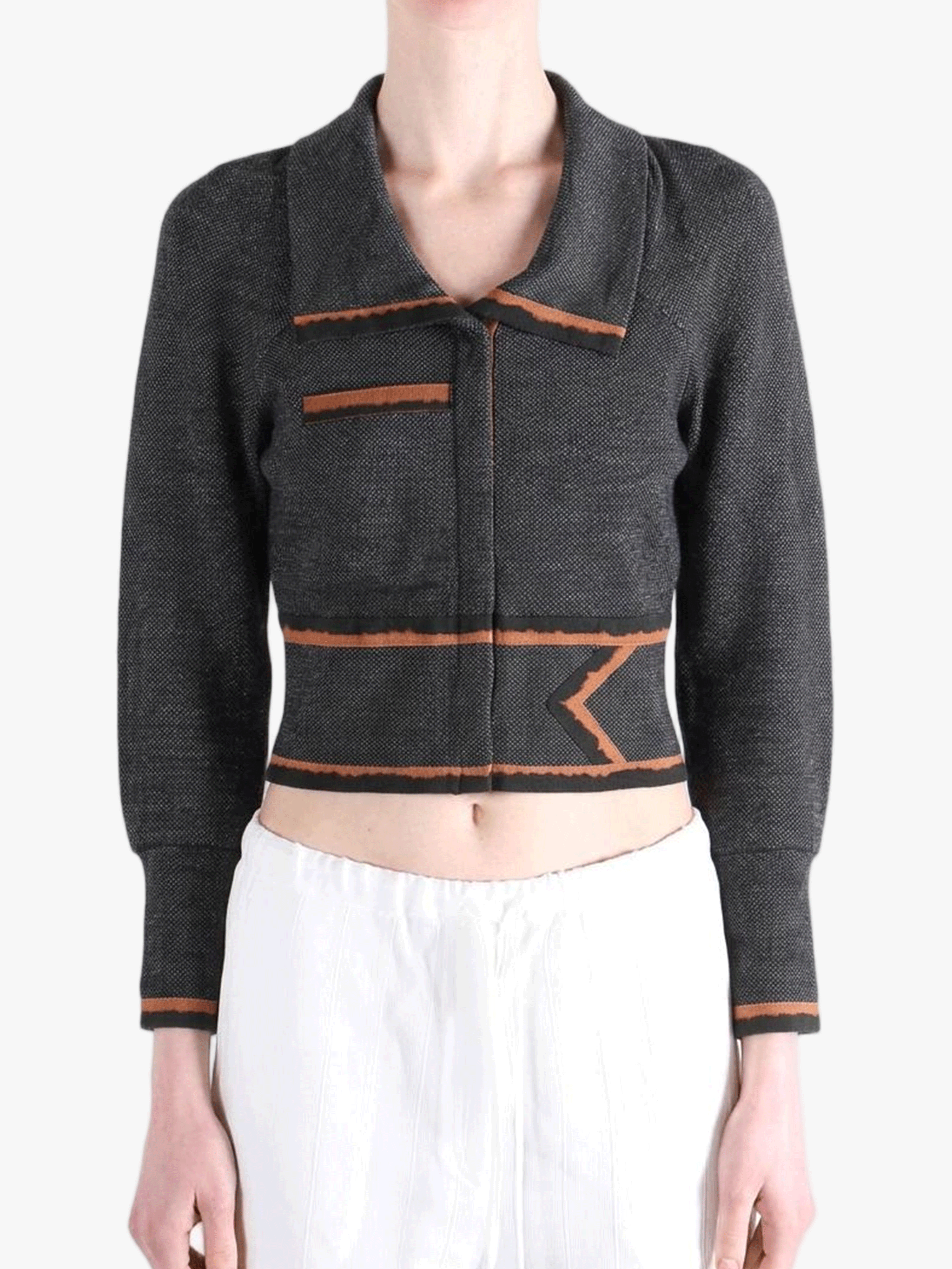 Black jacket worn by a person, showing the jacket fit