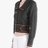 Black jacket worn by a person, side view