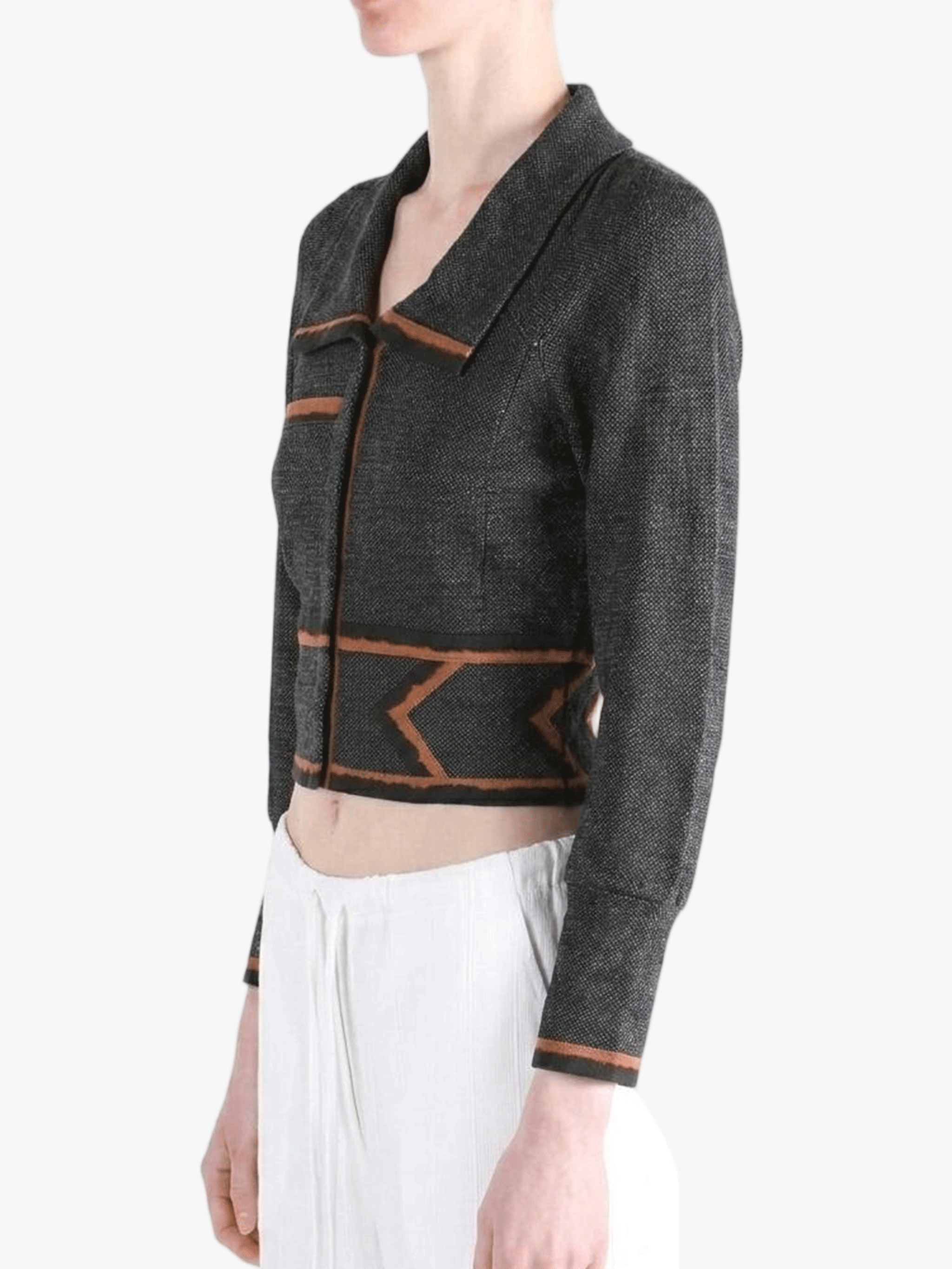 Black jacket worn by a person, side view