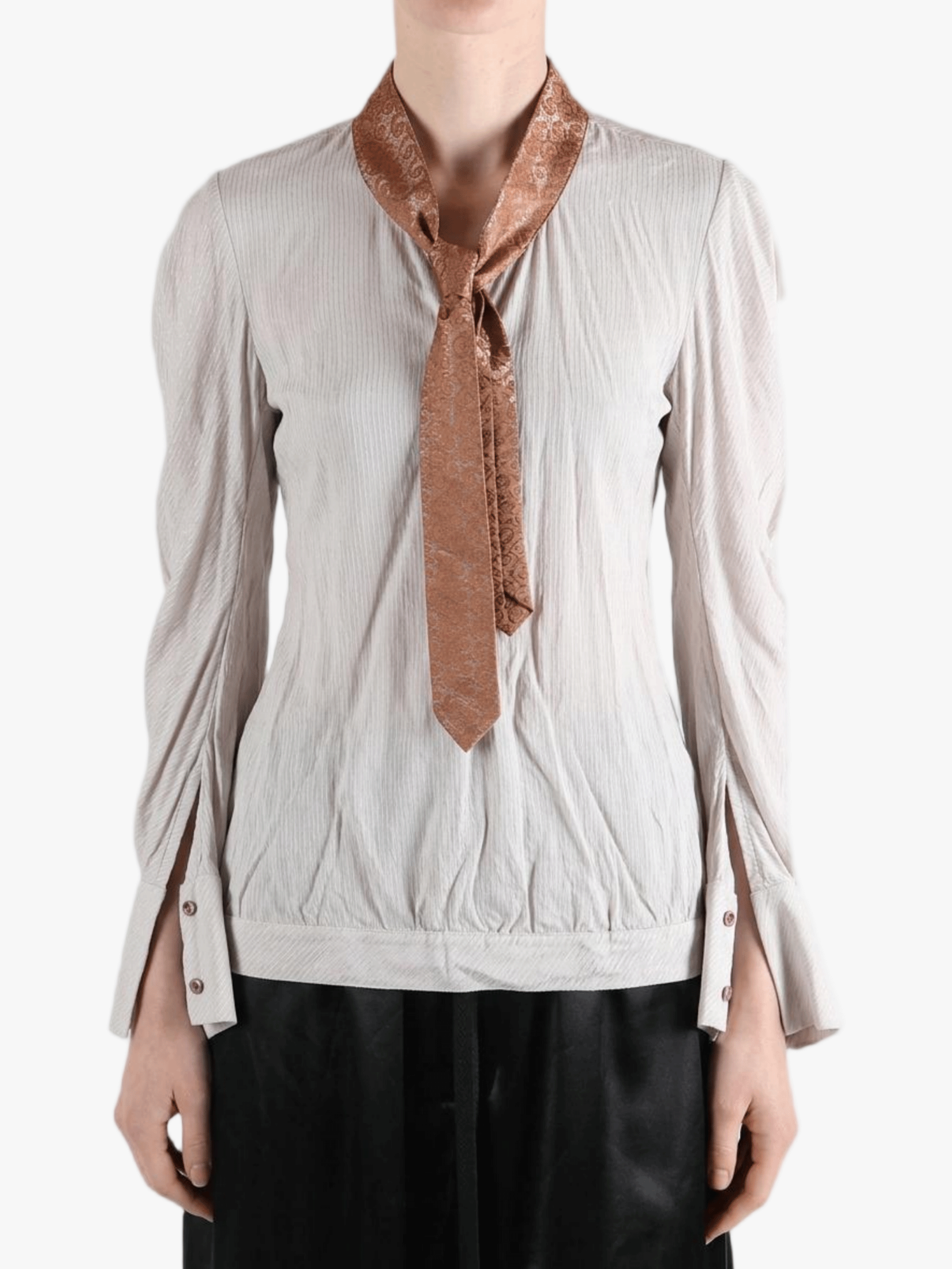 white top worn by a person, showing the top fit