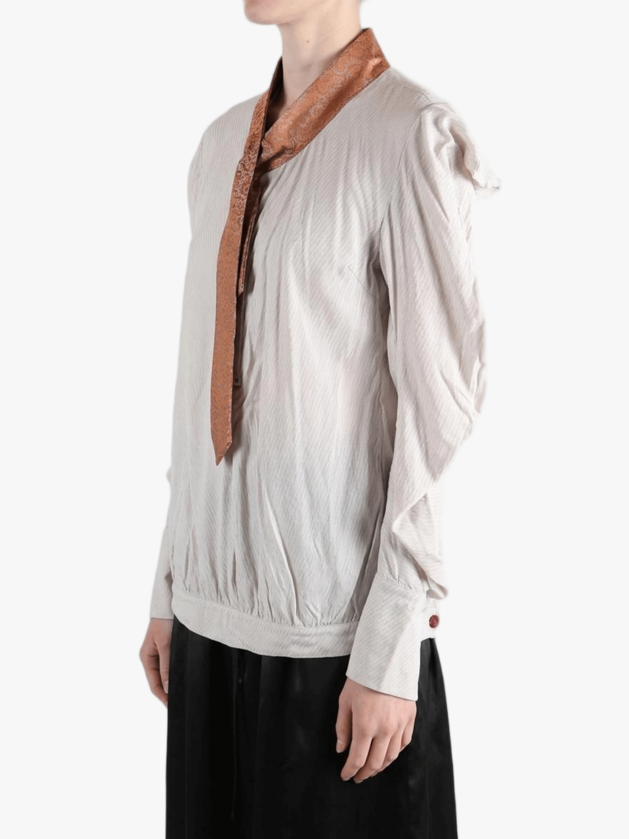 white top worn by a person, showing the top fit