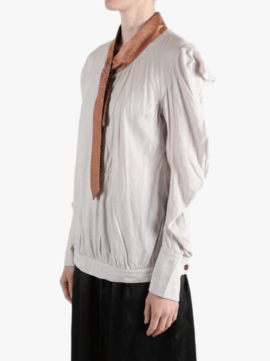white top worn by a person, showing the top fit