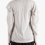 white top worn by a person, showing the top fit