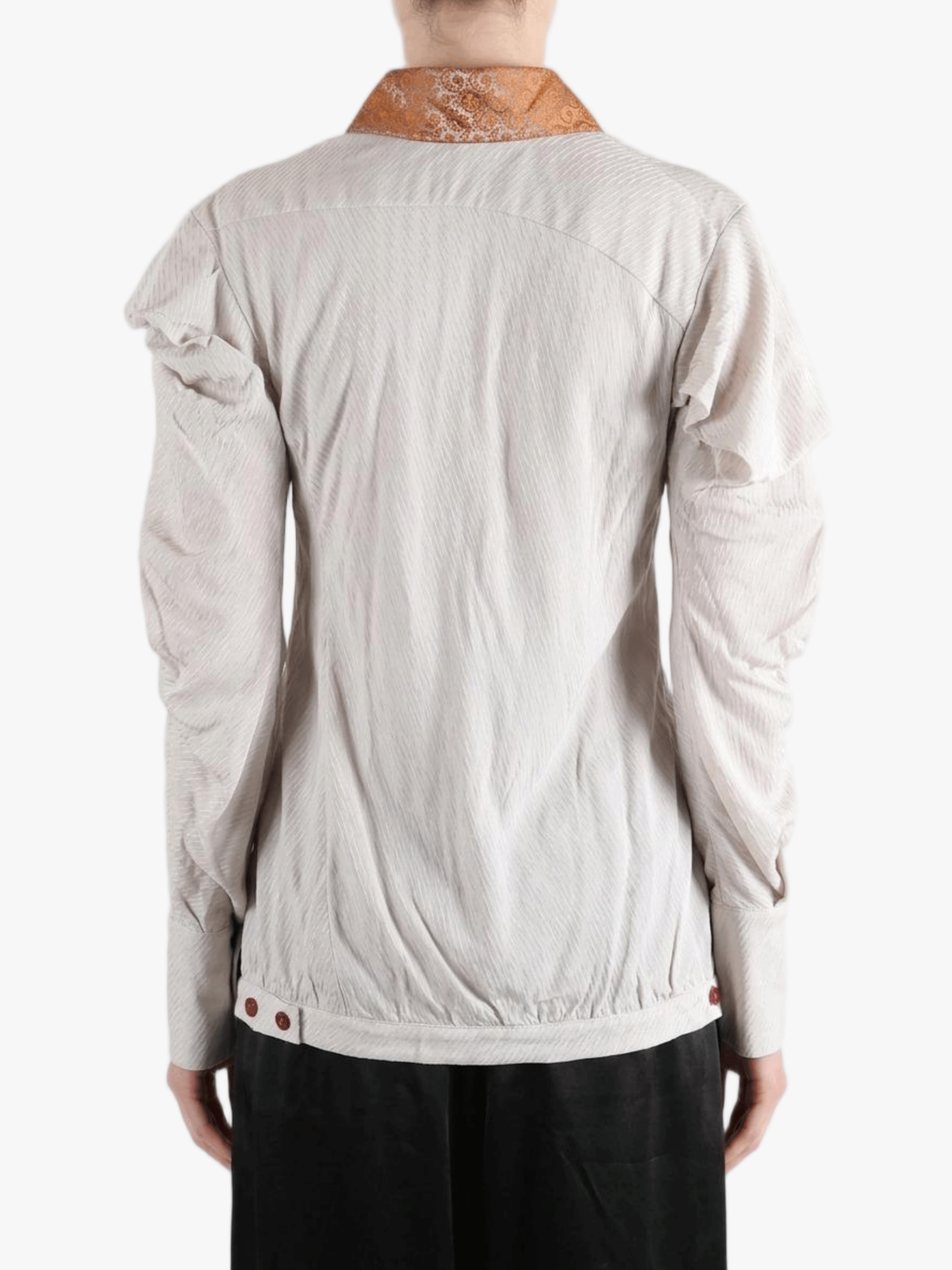 white top worn by a person, showing the top fit
