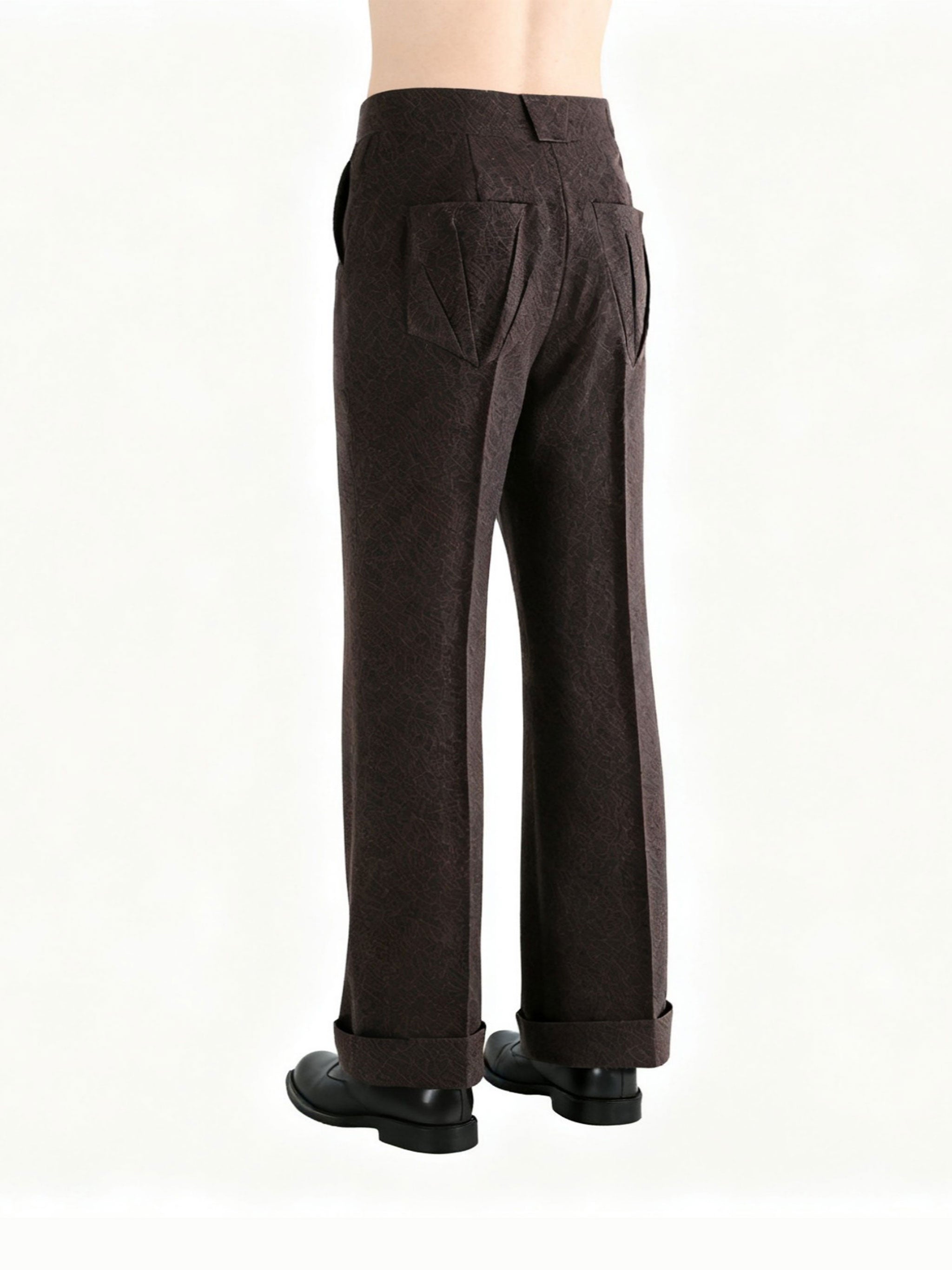 Brown pants worn by a person, side view