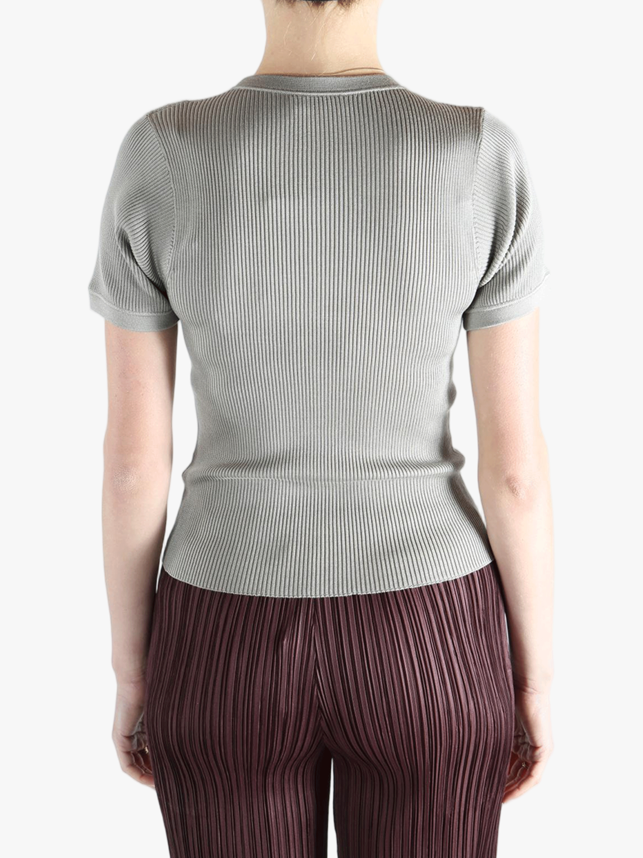 Grey t-shirt worn by a person, showing the t-shirt fit