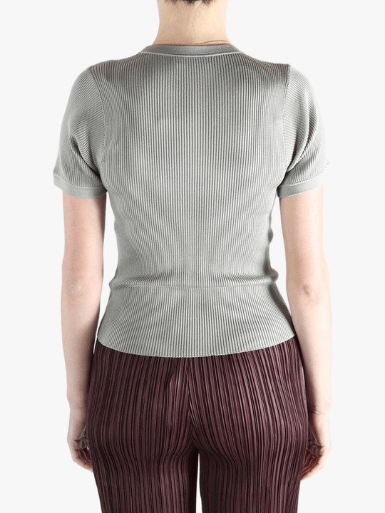 Grey t-shirt worn by a person, showing the t-shirt fit