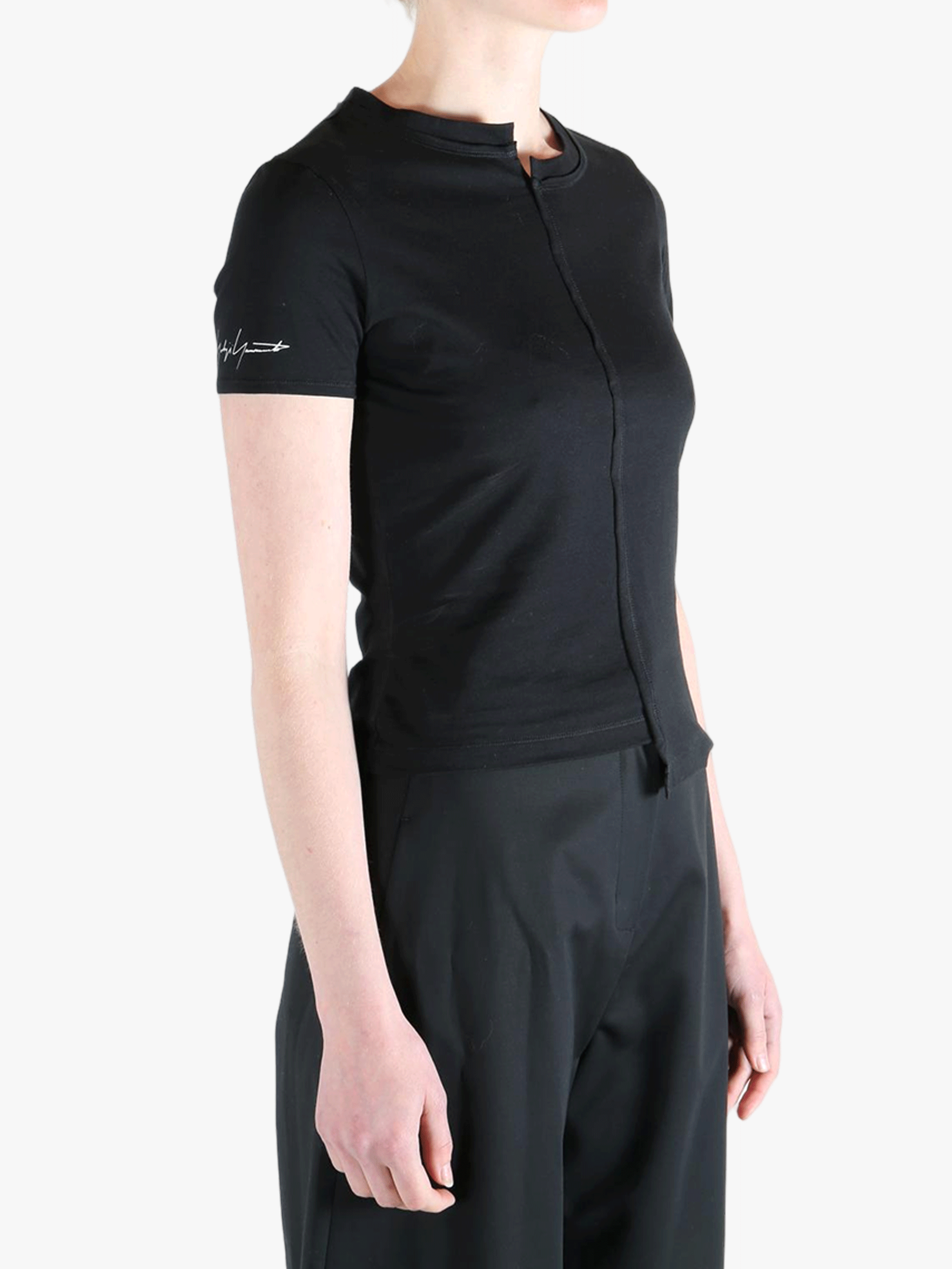 Black t-shirt worn by a person, showing the t-shirt's fit
