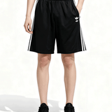 Black shorts worn by a person, showing the shorts fit