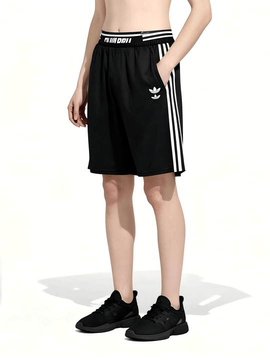 Black shorts worn by a person, side view