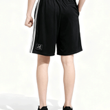 Black shorts worn by a person, back view