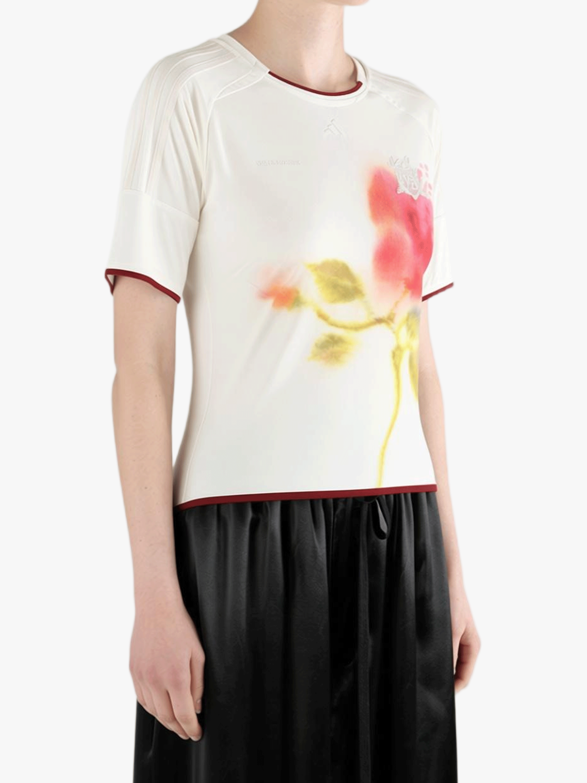 White top worn by a person, showing the top fit