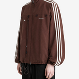 Brown jacket worn by a person, showing the jacket fit