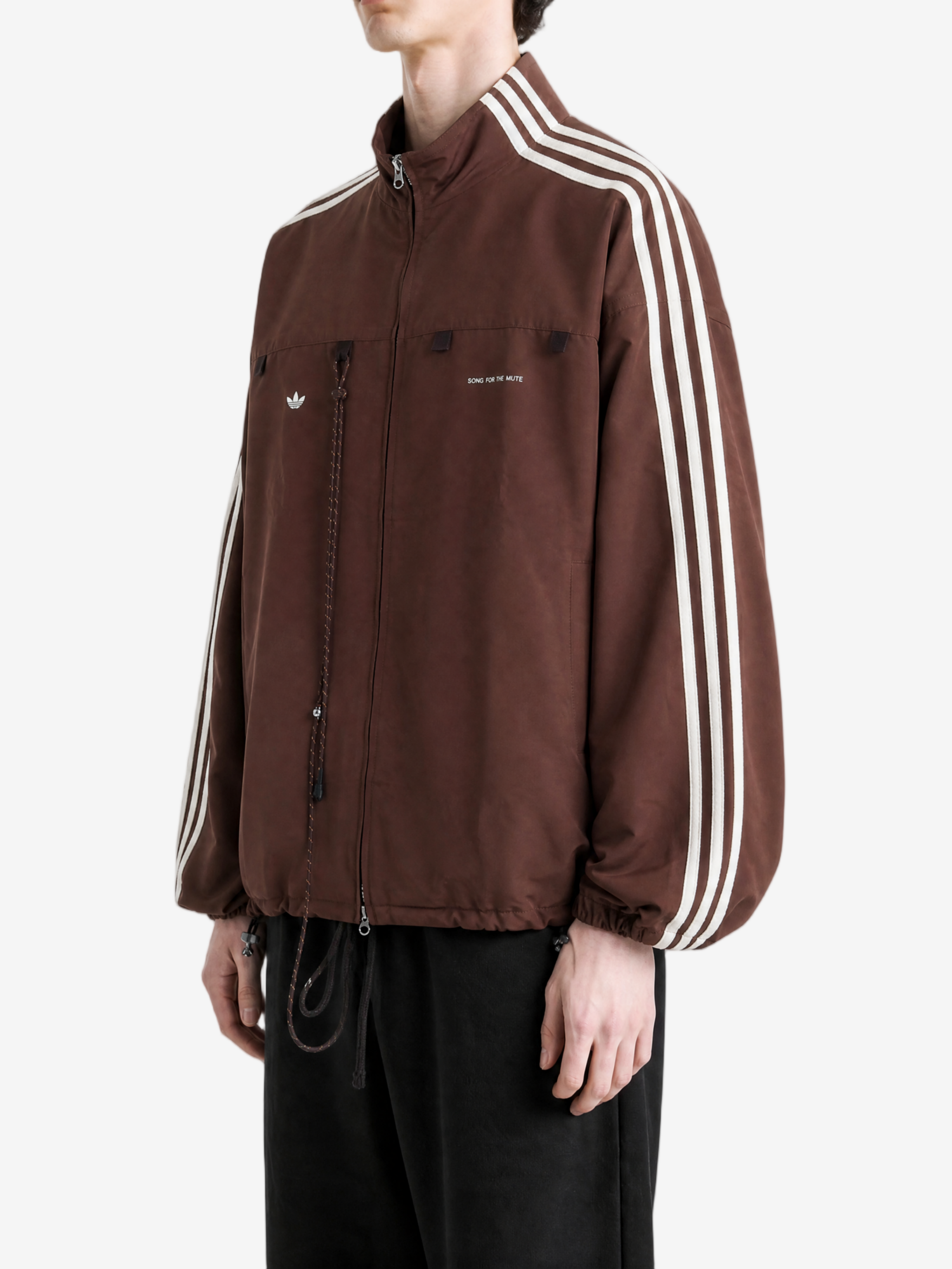 Brown jacket worn by a person, showing the jacket fit