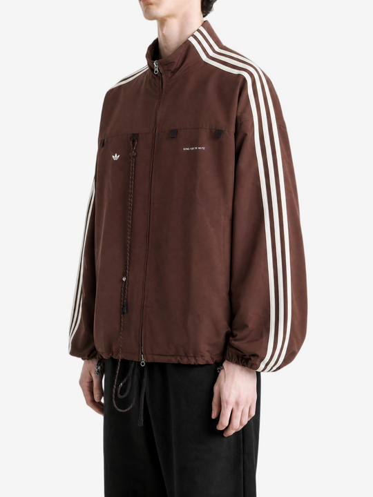 Brown jacket worn by a person, showing the jacket fit