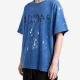Blue t-shirt worn by a person, showing the t-shirt fit