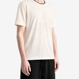 White t-shirt worn by a person, showing the t-shirt fit