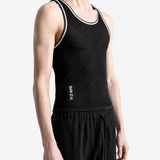 Black top worn by a person, showing the top fit