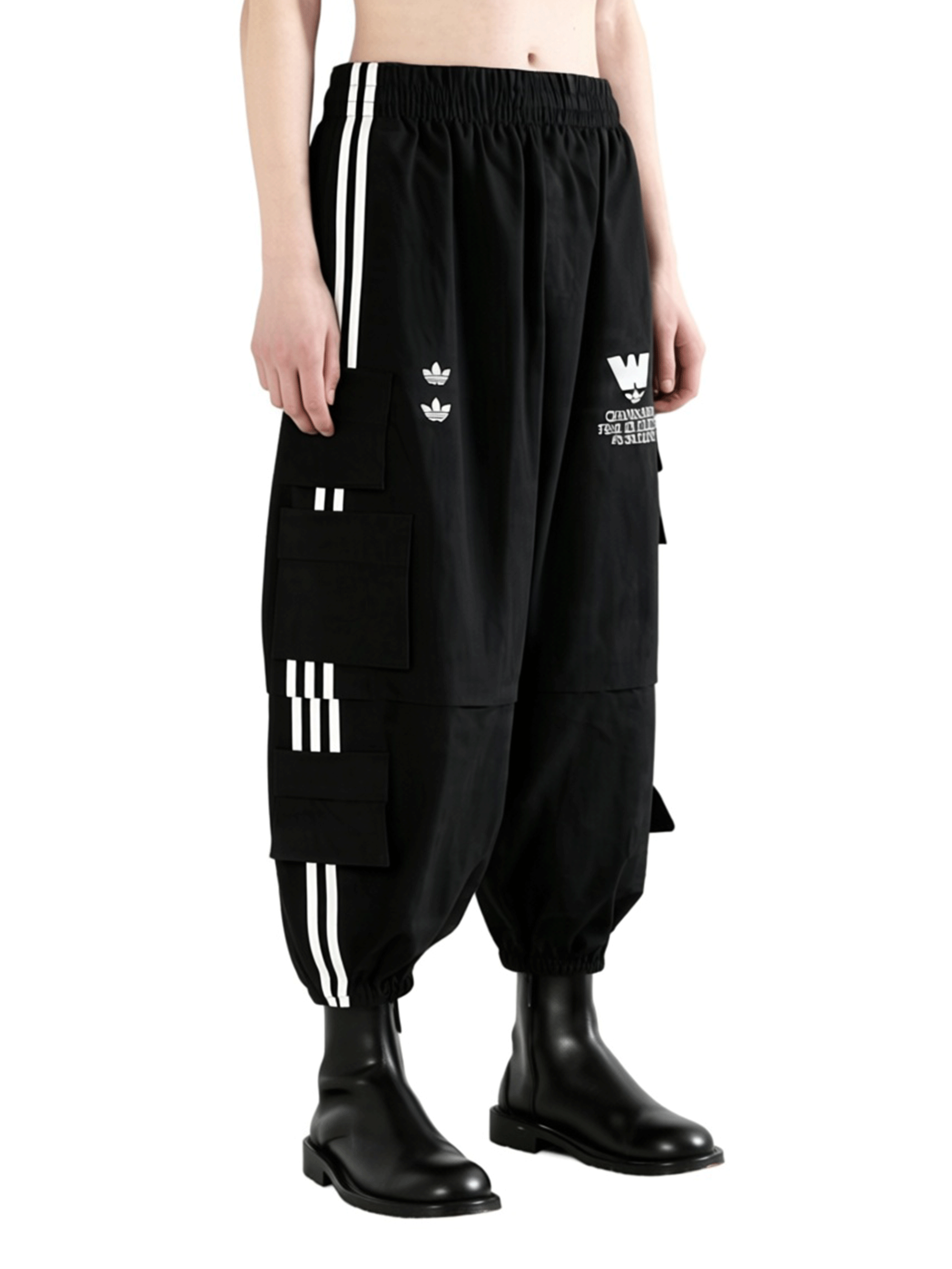 Black pants worn by a person, showing the pants's fit