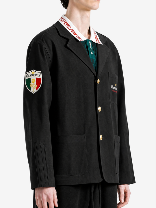 Black jacket worn by a person, showing the jacket fit