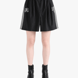 Black short worn by a person, showing the short fit