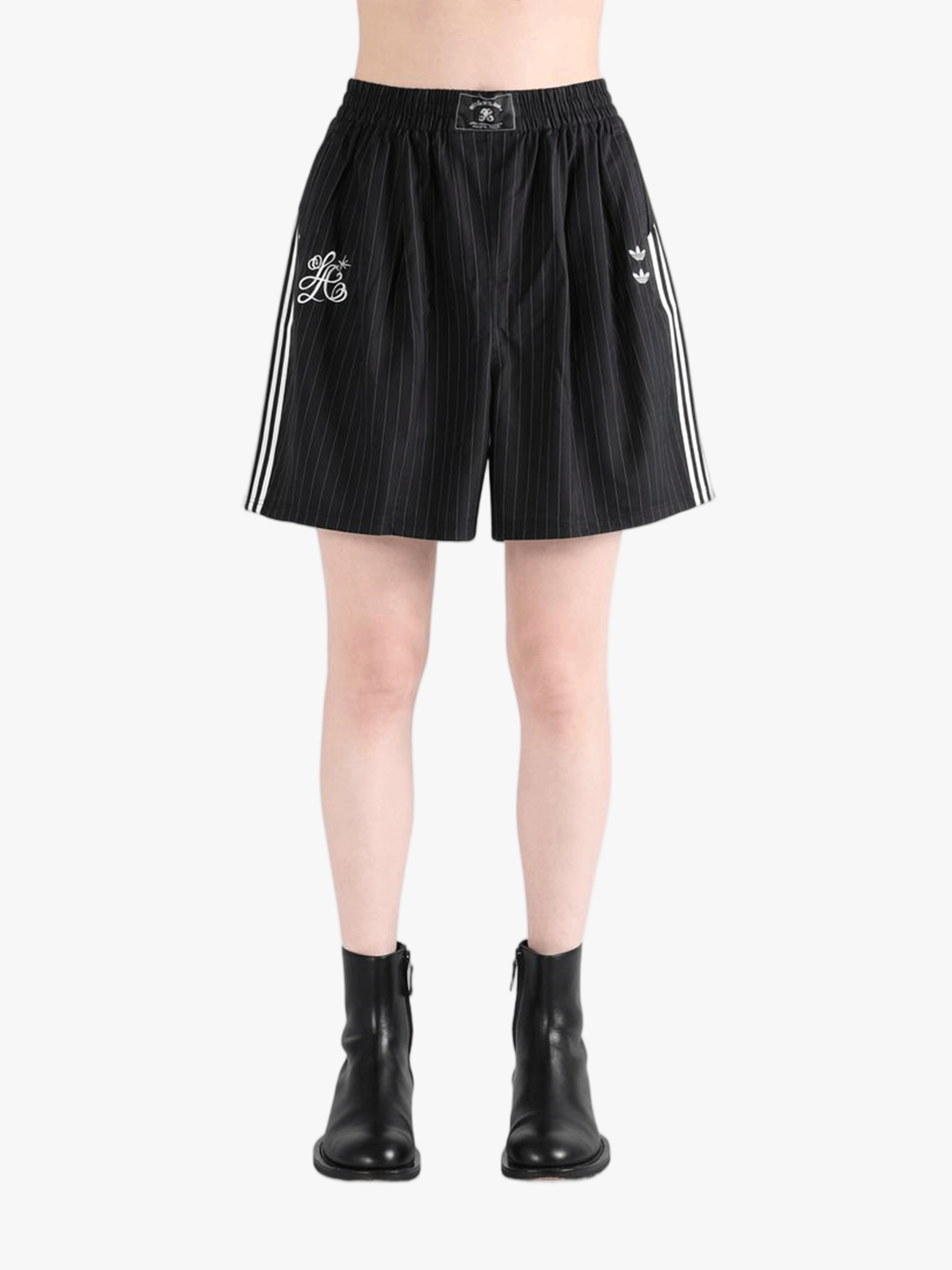Black short worn by a person, showing the short fit